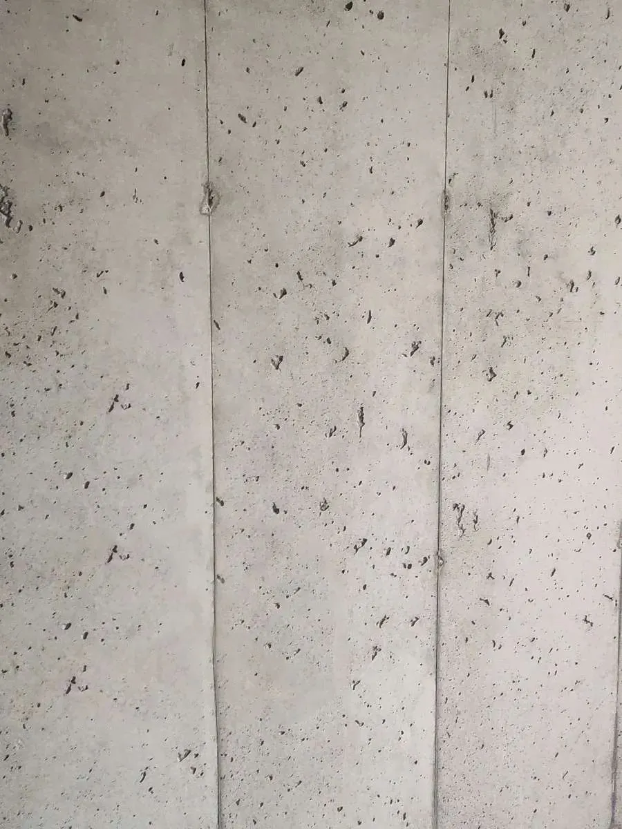 铝模施工混凝土表面为什么容易产生气孔?